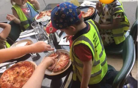 Our preschoolers ready to enjoy their pizza