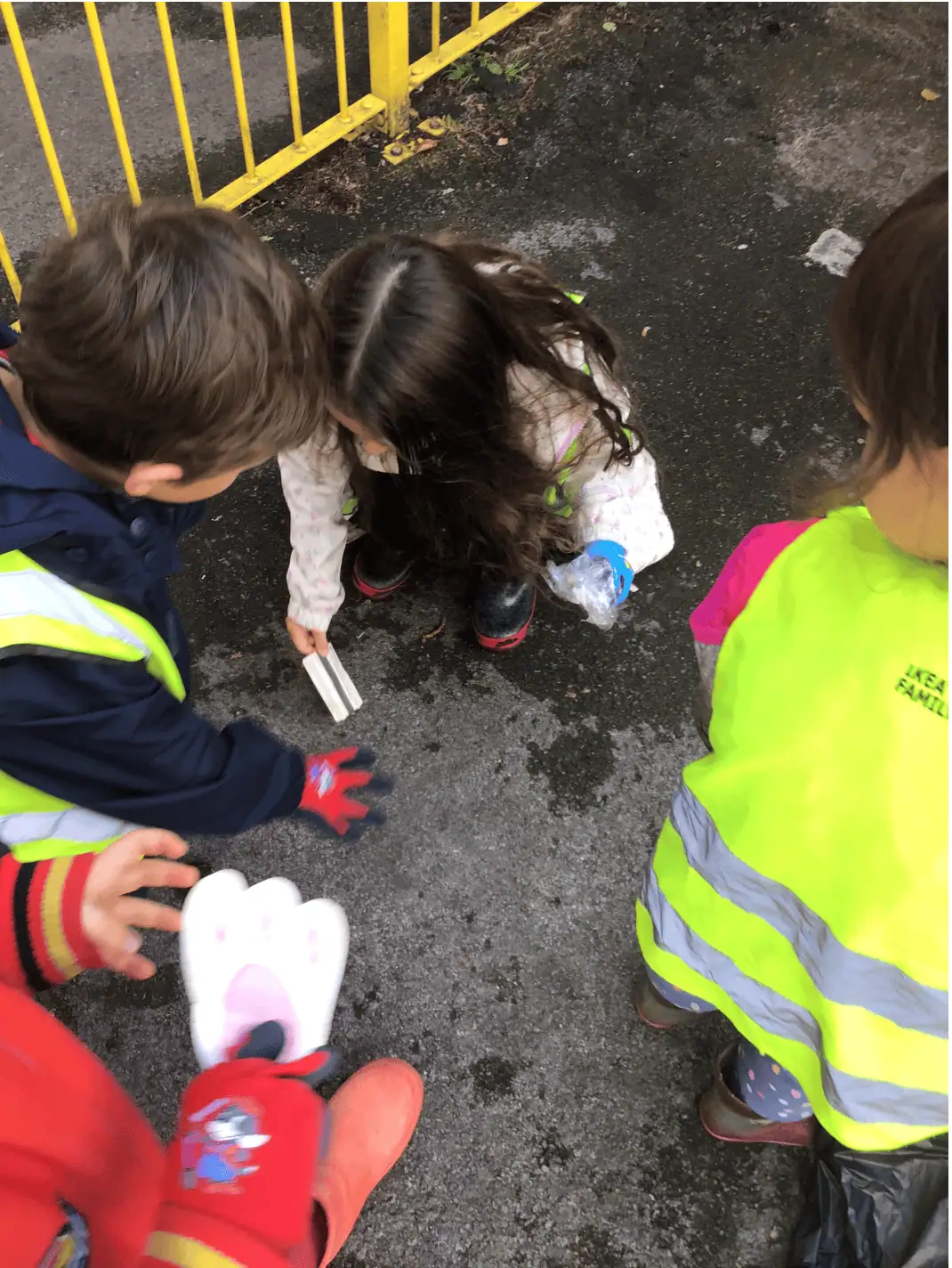 Boy and girl litter picking
